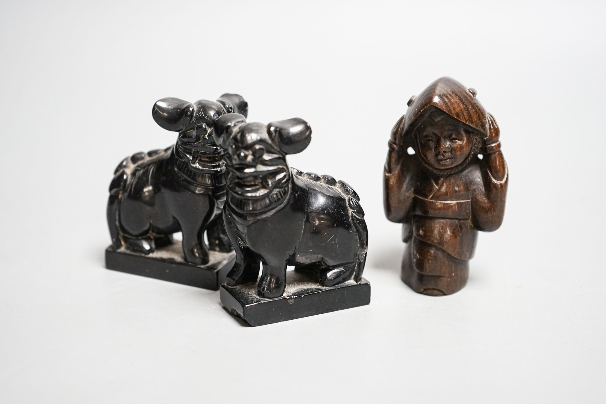 A quantity of hardwood netsuke and other carvings, signed